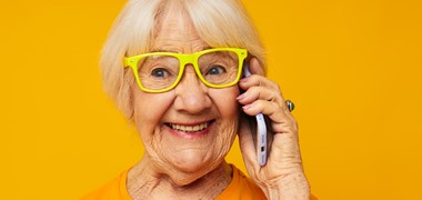 photo-retired-old-lady-happy-lifestyle-yellow-tshirts-with-phone-isolated-background (2).jpg